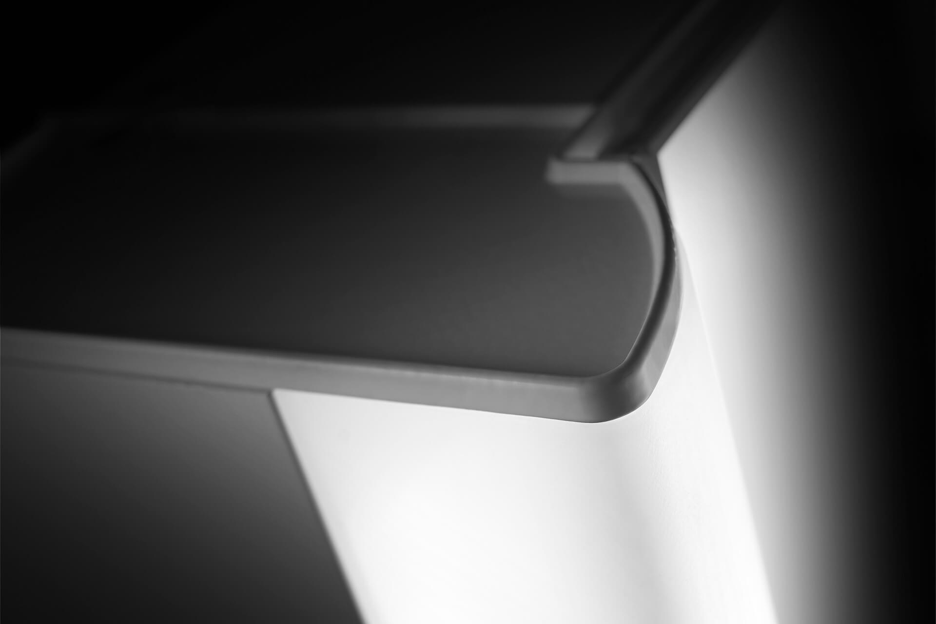 EASY Line Superior LED is the sophisticated cubic mirror cabinet for everyday use EASY Line Superior LED Mirror cabinet corner with black background.