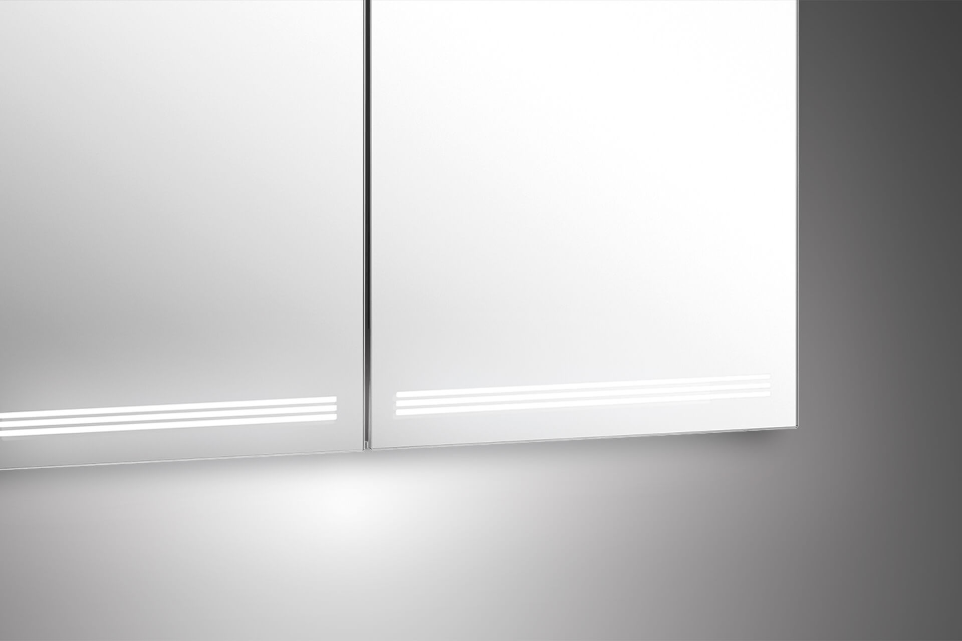 GRACE Line TW Armadio a specchi - Luce colorata senza limiti. GRACE Line TW Armadio a specchi con bande luminose in basso.