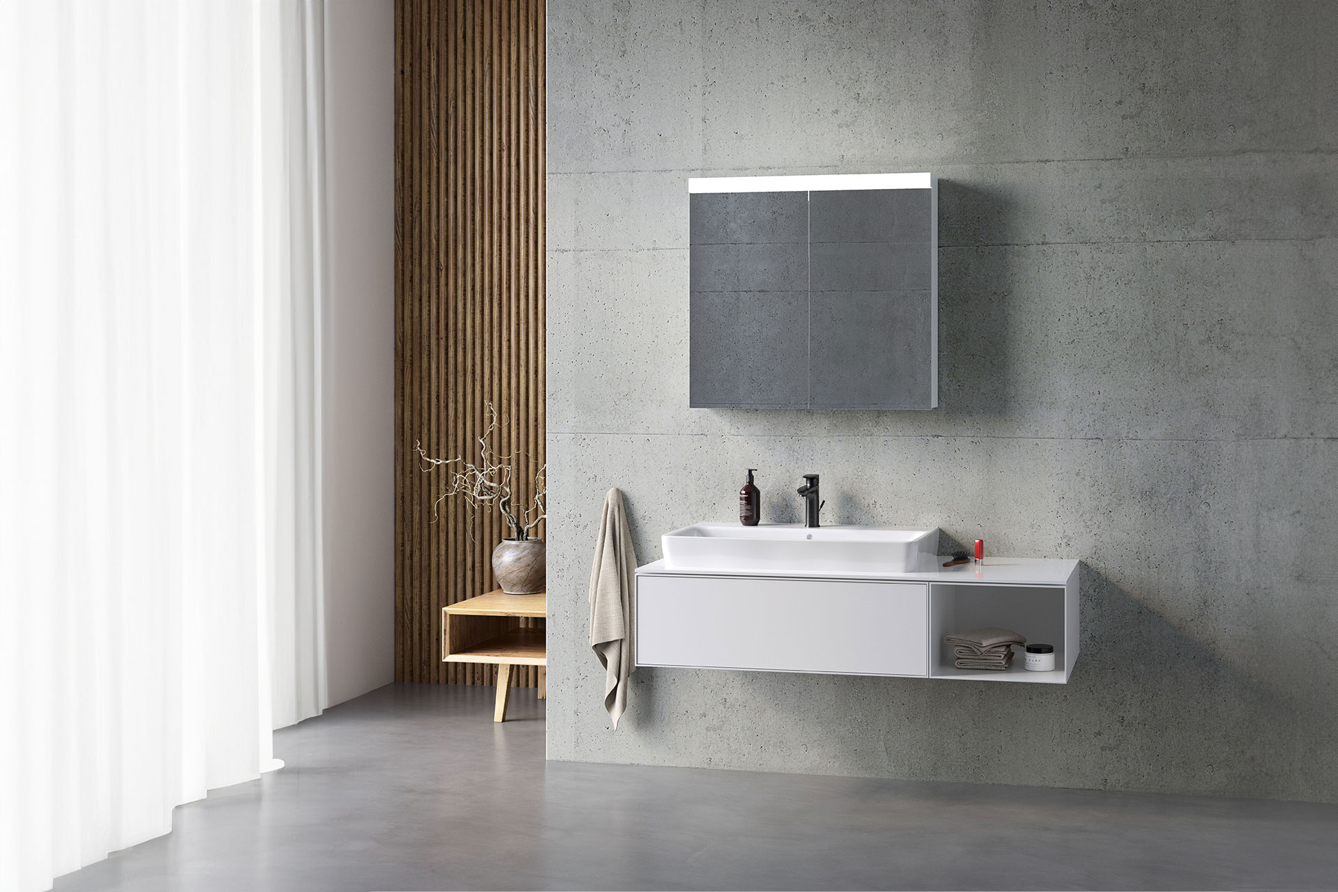 Schneider LOW basic LED Mirror cabinet on exposed concrete in a minimalist bathroom